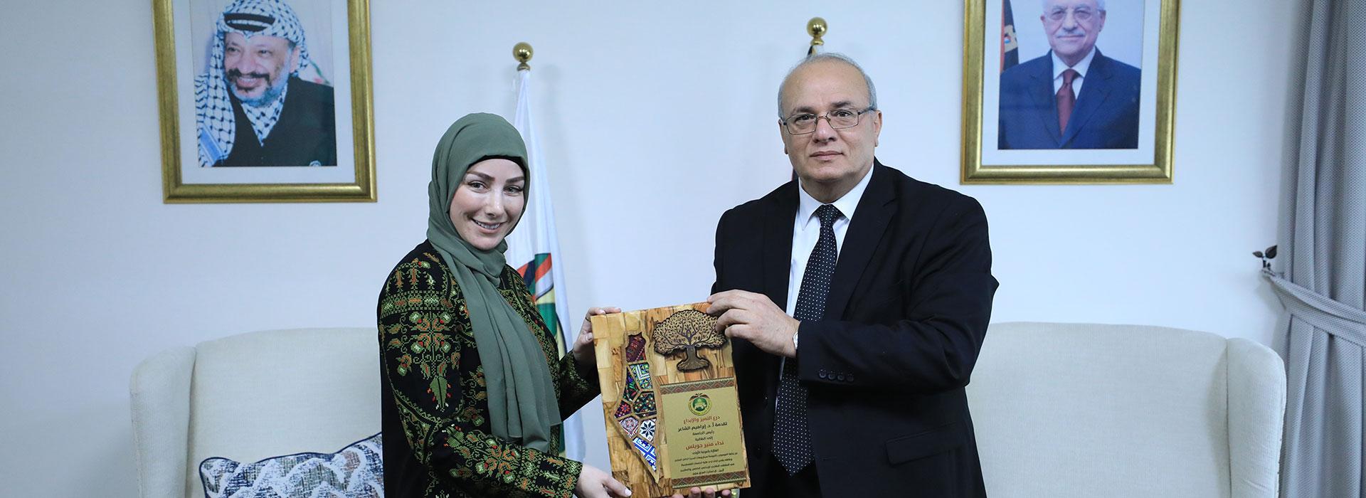 Prof. Ibrahim Al-Shaer Honors Student Nida Jweiles for achieving 1st place in the 25th Student Creativity Forum